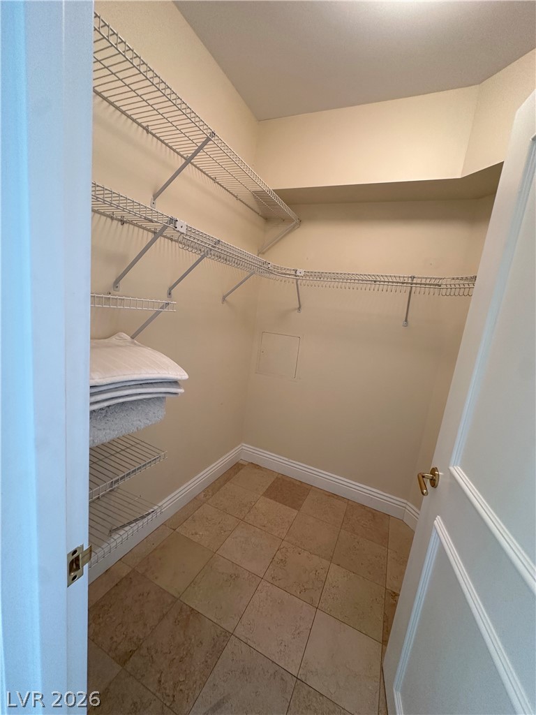 2747 Paradise Road, Unit 1706 Las Vegas, NV 89109 - Photo 9 of 35 Ample storage solutions define this practical and well-maintained closet space.