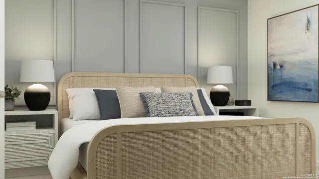 a bedroom with a bed and cabinet