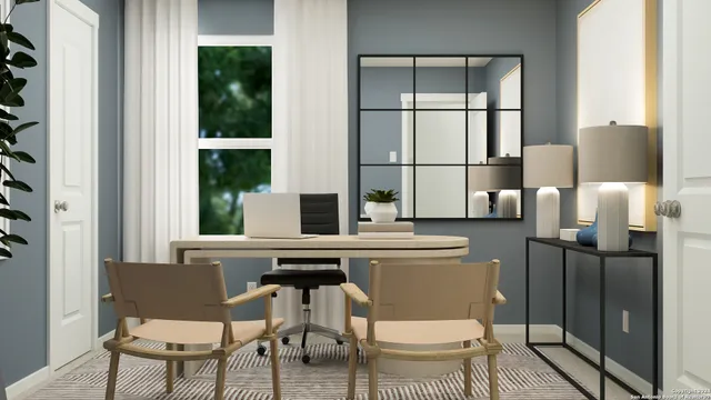 a kitchen with a table chairs and a refrigerator