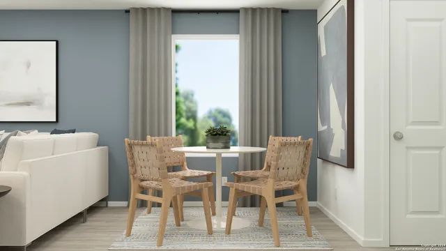 a dining room with furniture and window