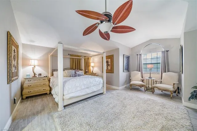 a bedroom with bed and window