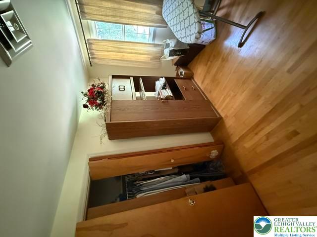 2045 Church Road Bethlehem, PA 18015 - Photo 29 of 42 Hardwood flooring extends throughout this versatile living space, offering warmth and continuity.
