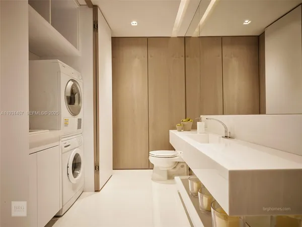 a bathroom with a sink a mirror and a shower