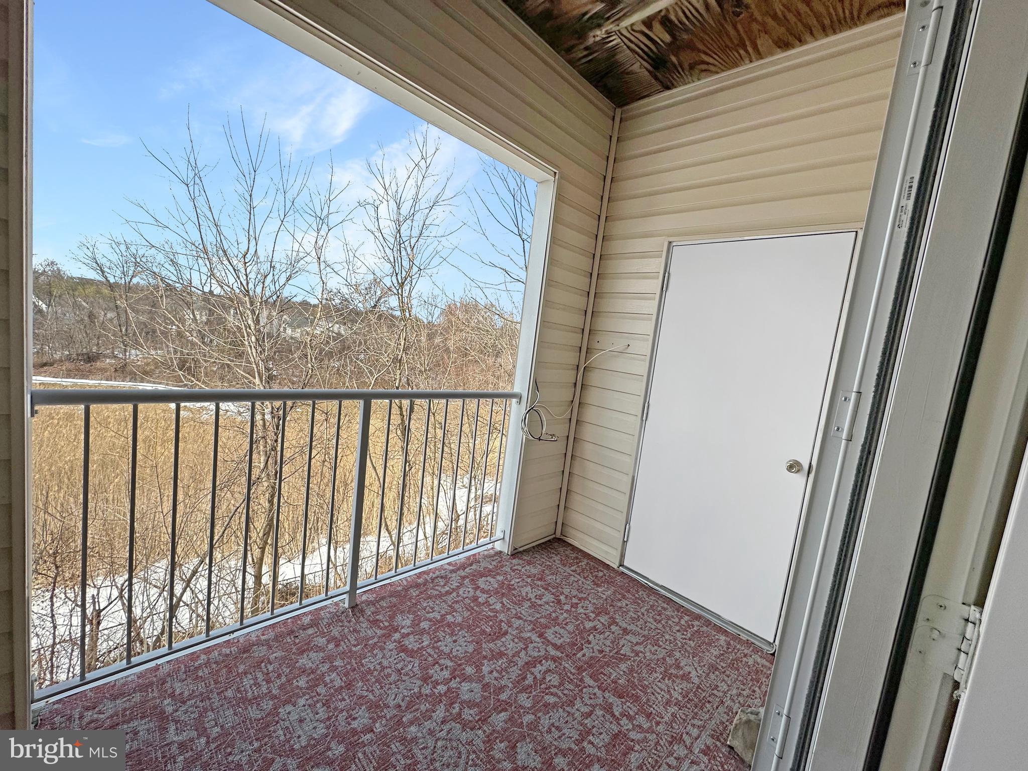 7205 Bogley Road, Unit 202 Baltimore, MD 21244 - Photo 11 of 11 a view of a porch