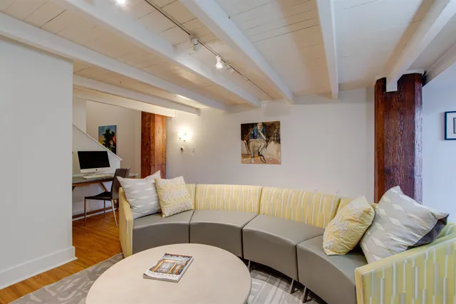 a living room with furniture and a couch