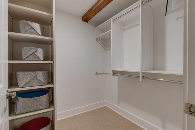 a view of an empty walk in closet