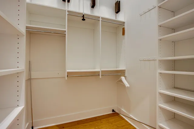 a view of a room with racks on the wall