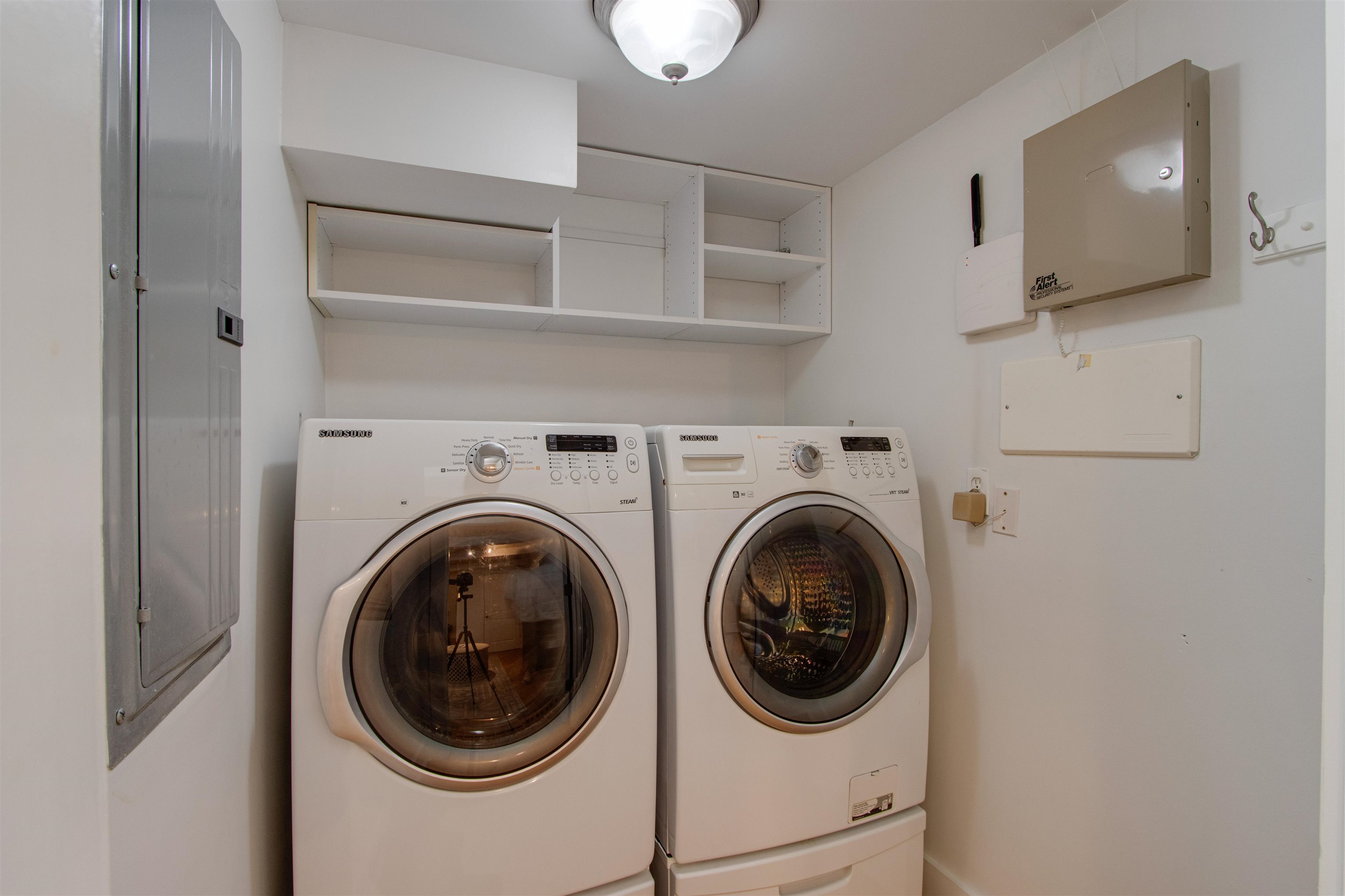 435 South Front Street, Unit 105 Memphis, TN 38103 - Photo 28 of 40 a utility room with dryer and washer