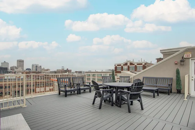 a view of a terrace with seating area