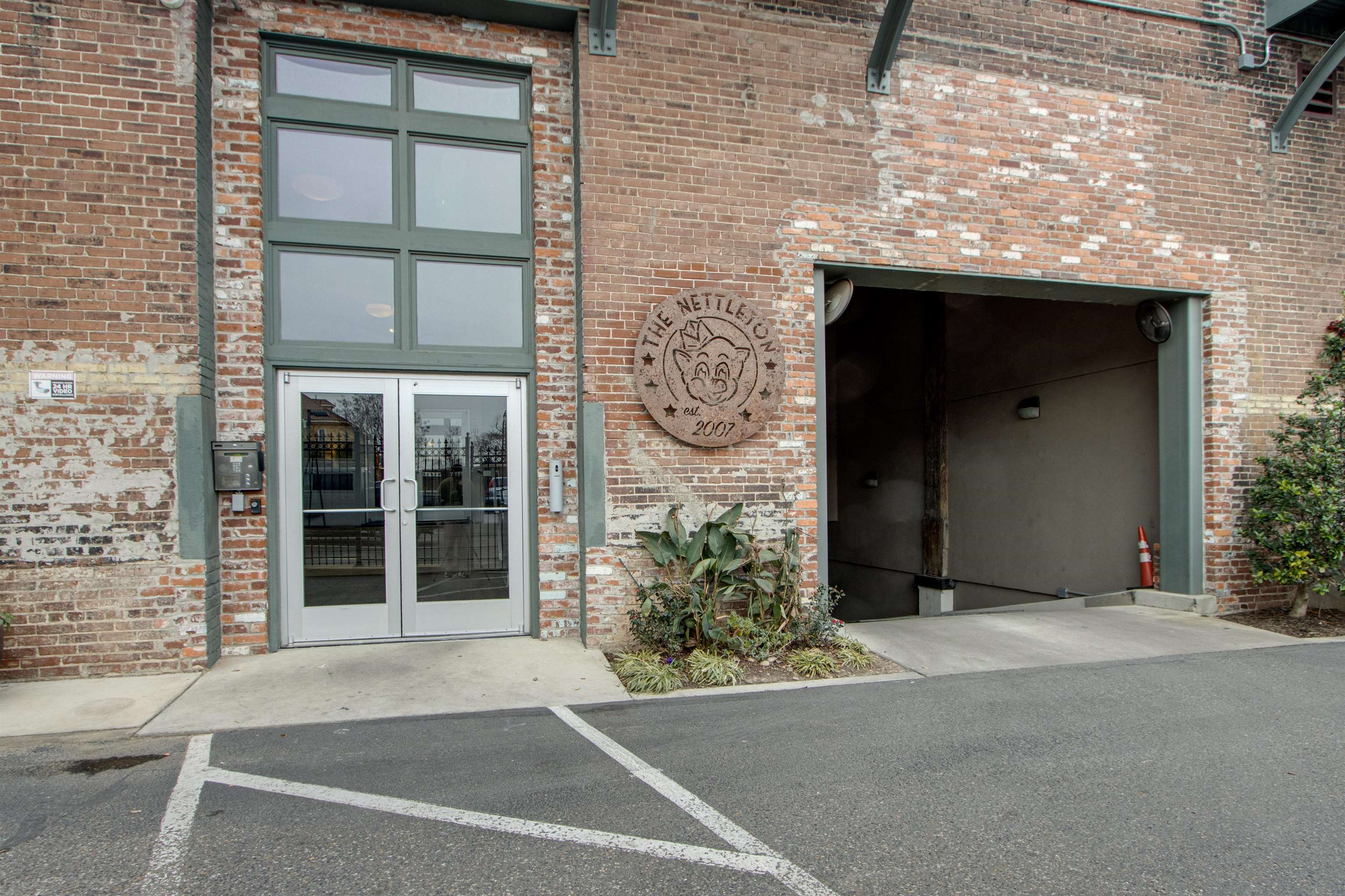 435 South Front Street, Unit 105 Memphis, TN 38103 - Photo 35 of 40 a brick building with a entrance door