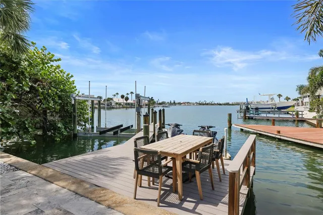 a view of a terrace with furniture and stove