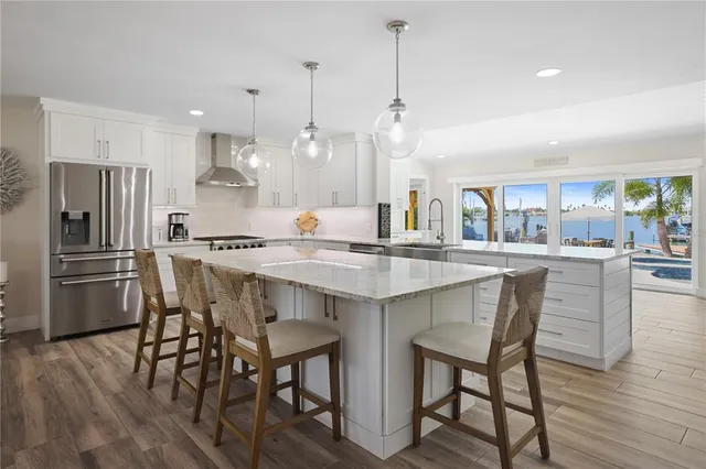 a kitchen with a table and chairs in it