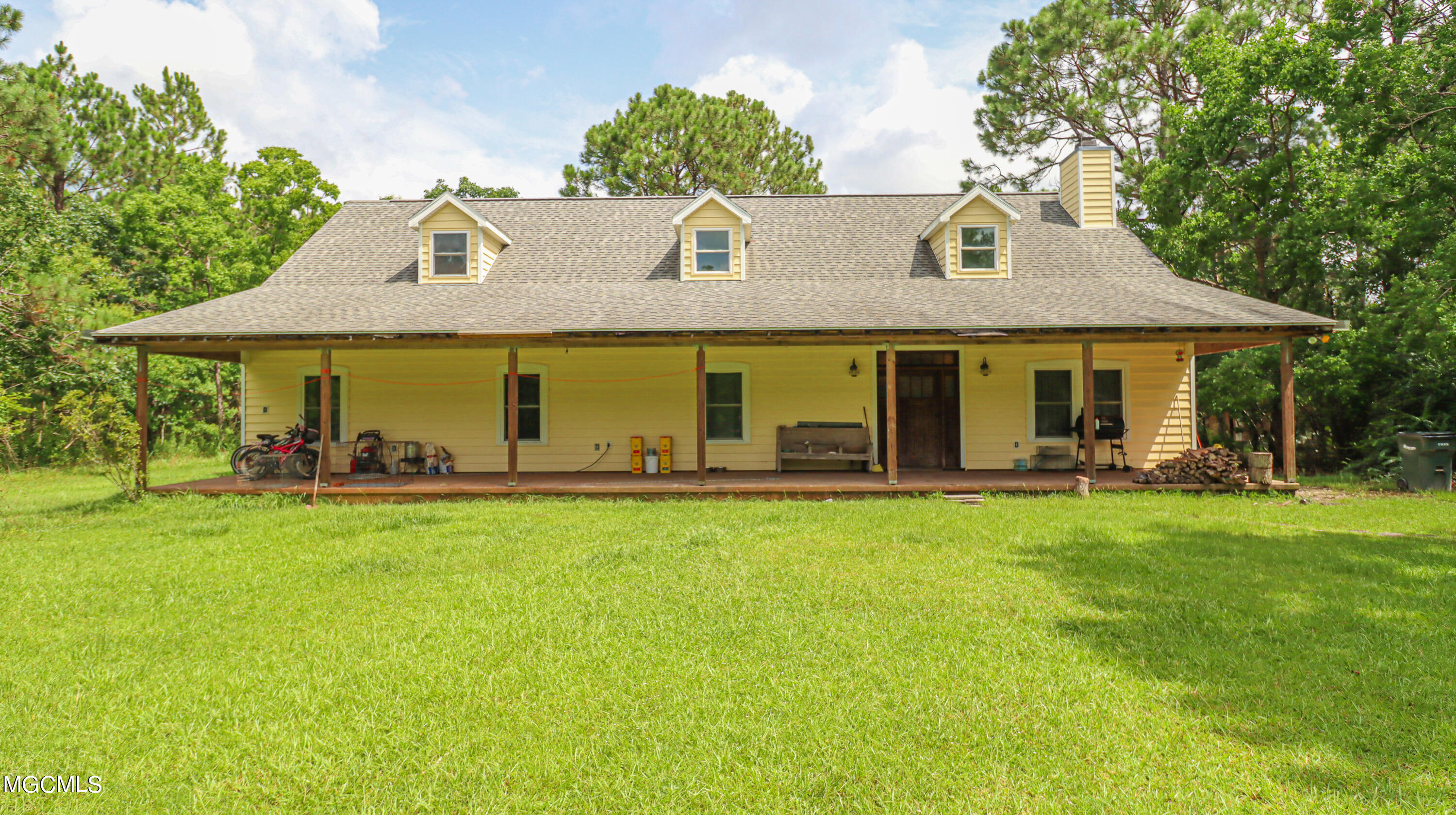 5328 Lower Bay Road Bay St. Louis, MS 39520 - Photo 1 of 29 5328 Lower Bay Rd front view with porch