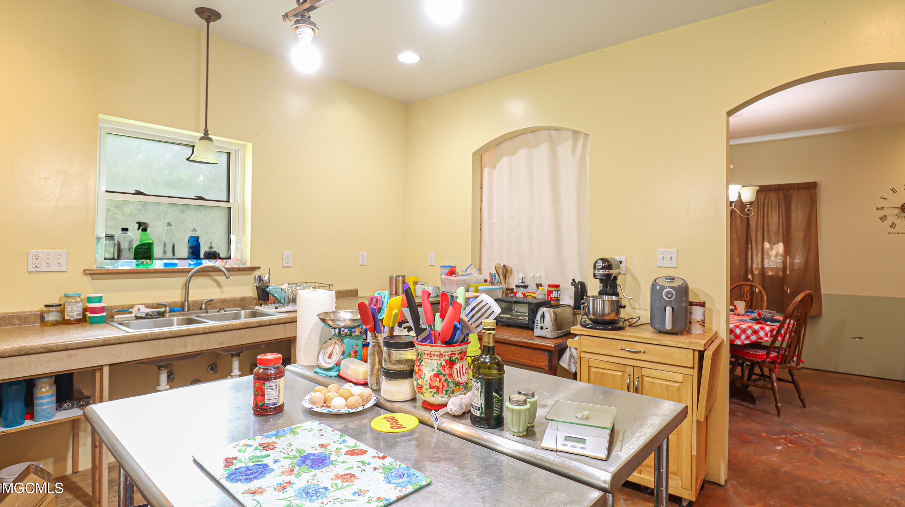 5328 Lower Bay Road Bay St. Louis, MS 39520 - Photo 8 of 29 Kitchen view into Dining room