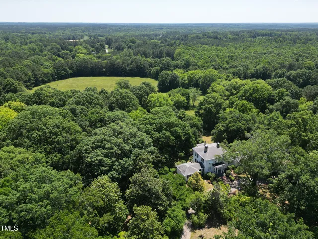 a view of a house with a street