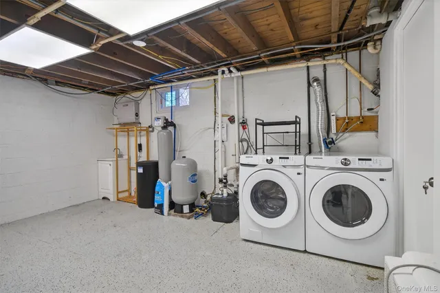 a view of a livingroom with wooden floor and a window