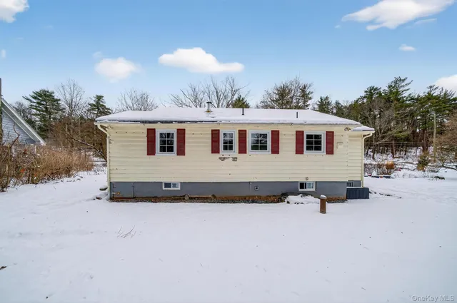 a view of backyard of house