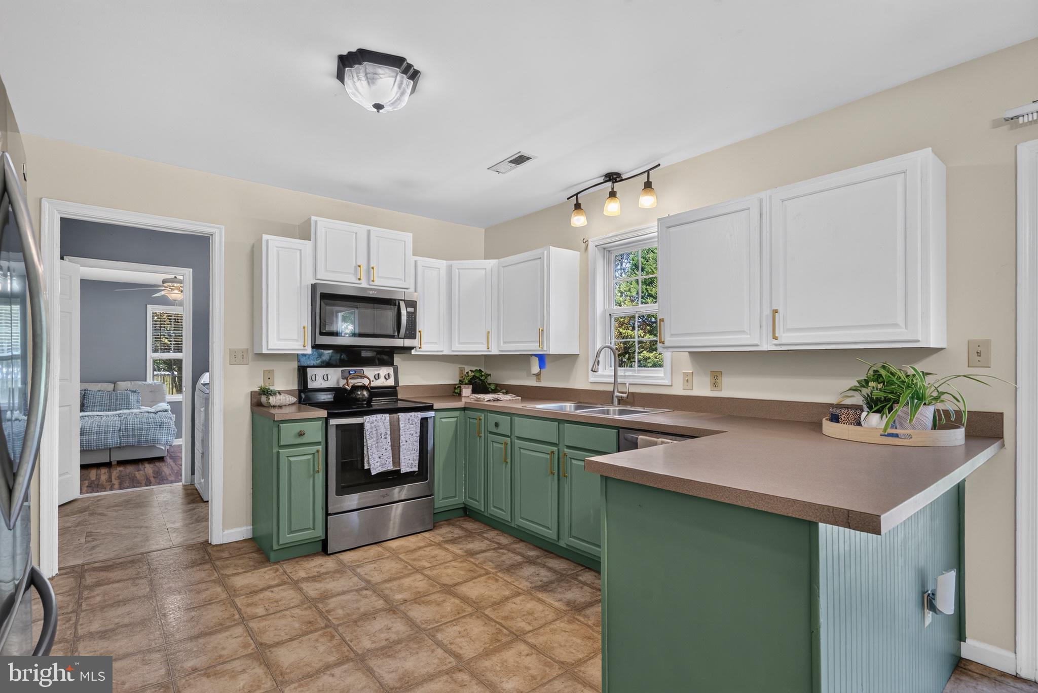 5716 Bethlehem Road Preston, MD 21655 - Photo 8 of 37 Charming kitchen with modern flair.