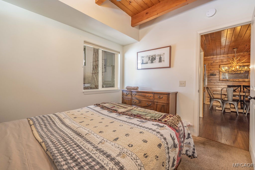 43411 Sheephorn Road Big Bear Lake, CA 92315 - Photo 14 of 50 a bedroom with a bed and a window