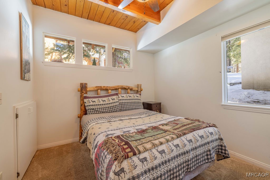 43411 Sheephorn Road Big Bear Lake, CA 92315 - Photo 15 of 50 a bedroom with a bed and a painting on the wall