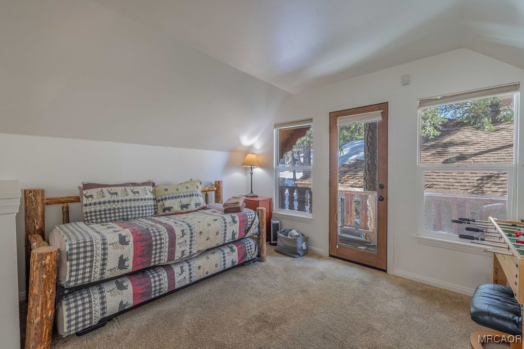 43411 Sheephorn Road Big Bear Lake, CA 92315 - Photo 27 of 50 a bed room with a bed and a couch