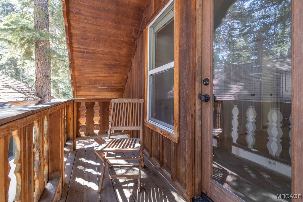 43411 Sheephorn Road Big Bear Lake, CA 92315 - Photo 31 of 50 a view of a balcony with wooden floor
