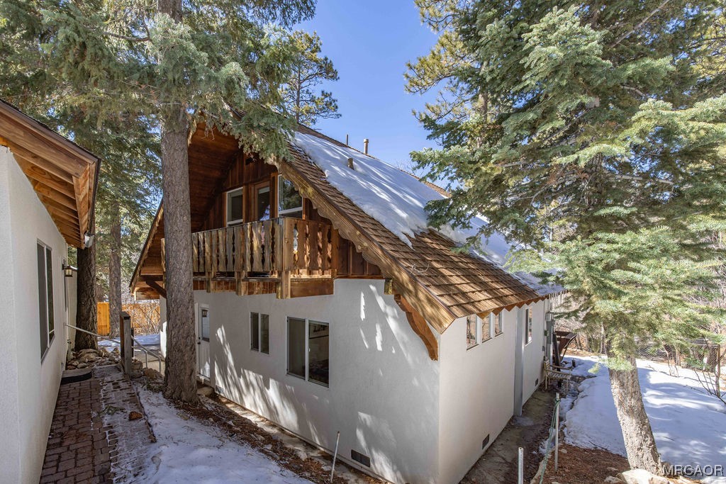 43411 Sheephorn Road Big Bear Lake, CA 92315 - Photo 32 of 50 a view of a house with a yard
