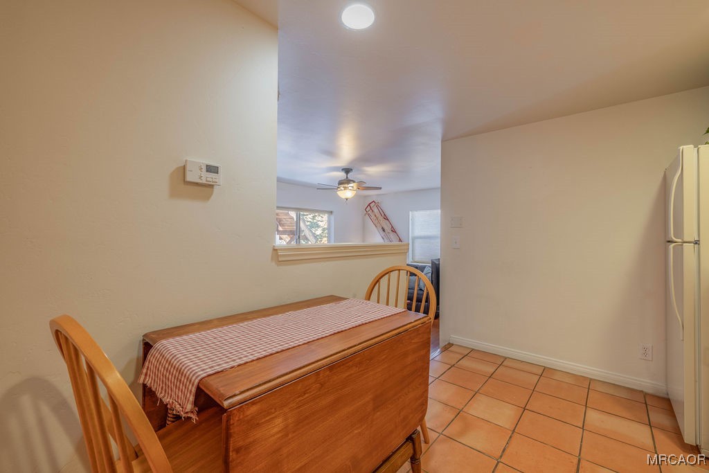 43411 Sheephorn Road Big Bear Lake, CA 92315 - Photo 39 of 50 a room with a bed and a table