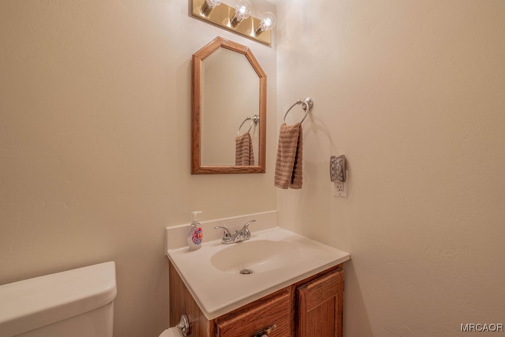 43411 Sheephorn Road Big Bear Lake, CA 92315 - Photo 43 of 50 a bathroom with a sink and a mirror