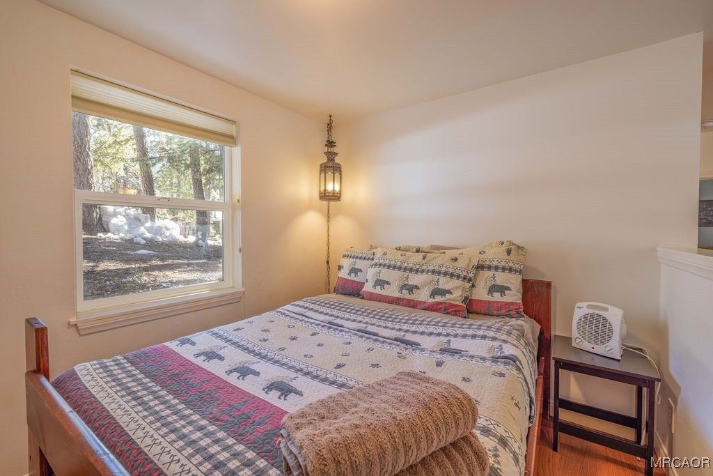 43411 Sheephorn Road Big Bear Lake, CA 92315 - Photo 45 of 50 a bedroom with a bed and a window