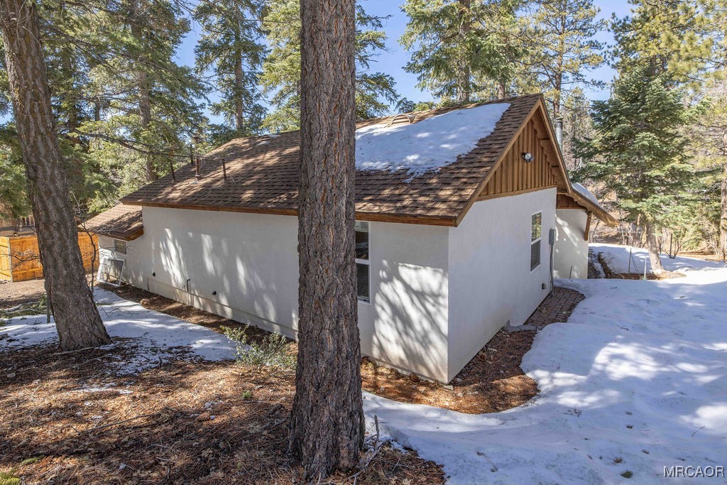 43411 Sheephorn Road Big Bear Lake, CA 92315 - Photo 47 of 50 a view of a house with a yard