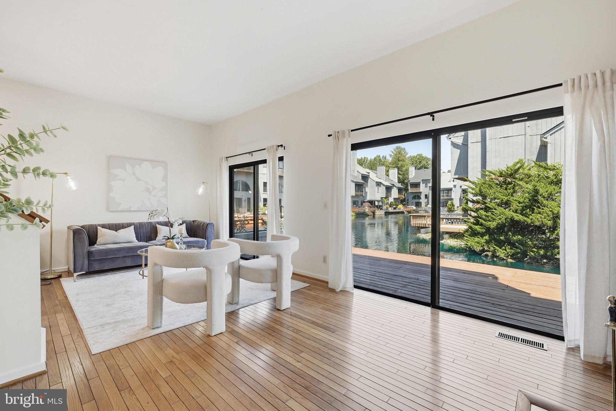 11124 Glade Drive Reston, VA 20191 - Photo 3 of 47 Spacious Living Room Overlooking The Wharf Pond