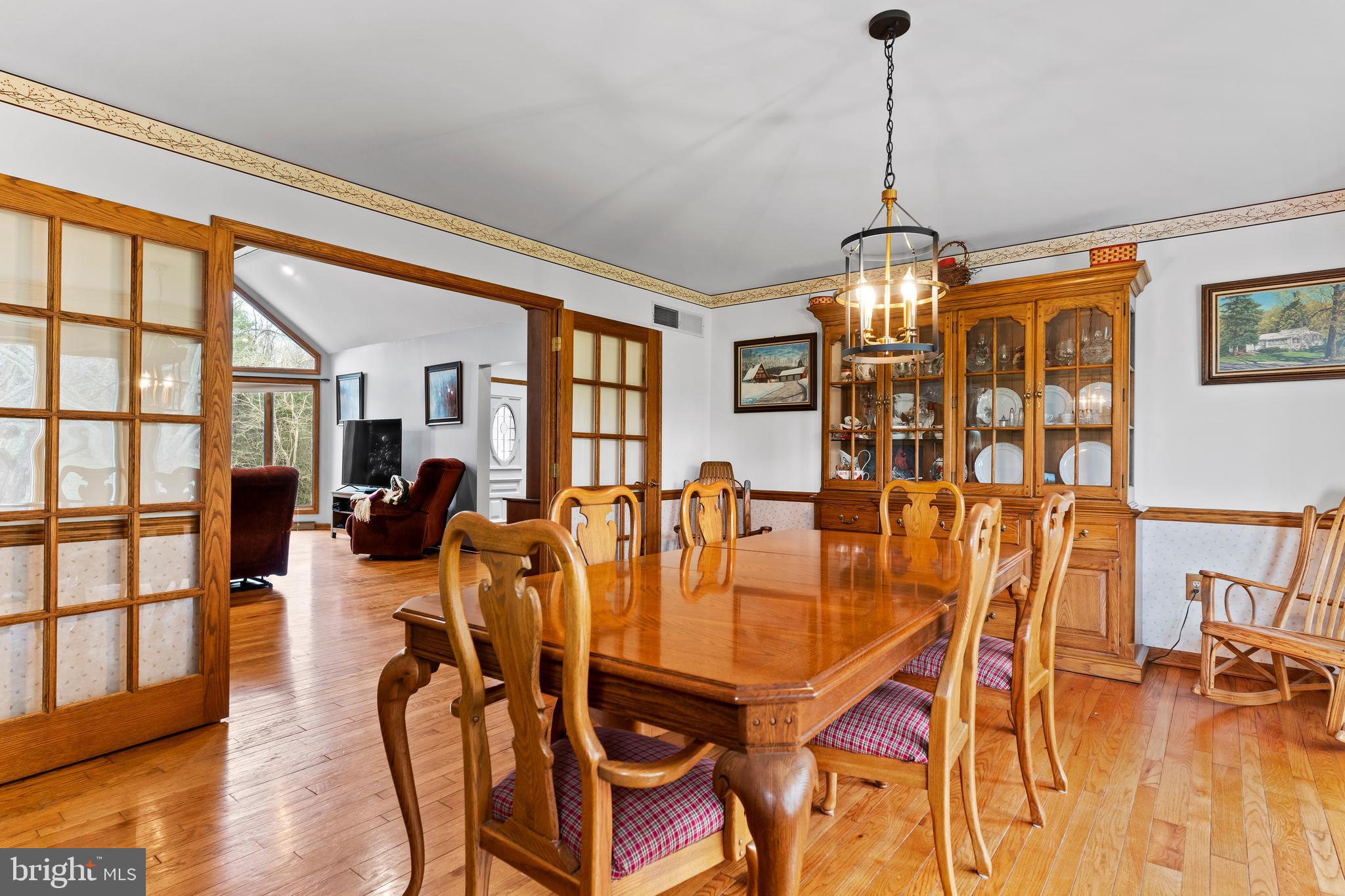 540 Springfield Road Newville, PA 17241 - Photo 12 of 59 a dining room with furniture a chandelier and wooden floor