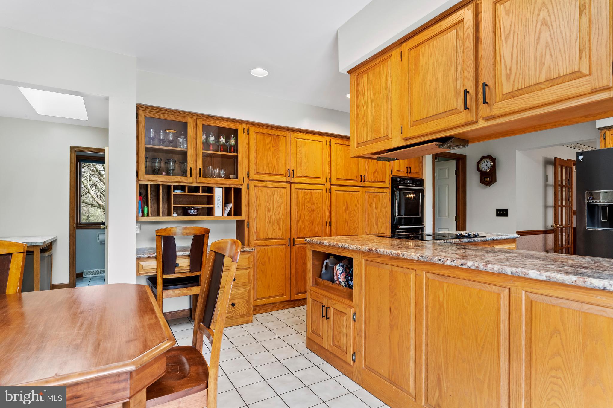540 Springfield Road Newville, PA 17241 - Photo 22 of 59 a view of a kitchen with dining table and chairs