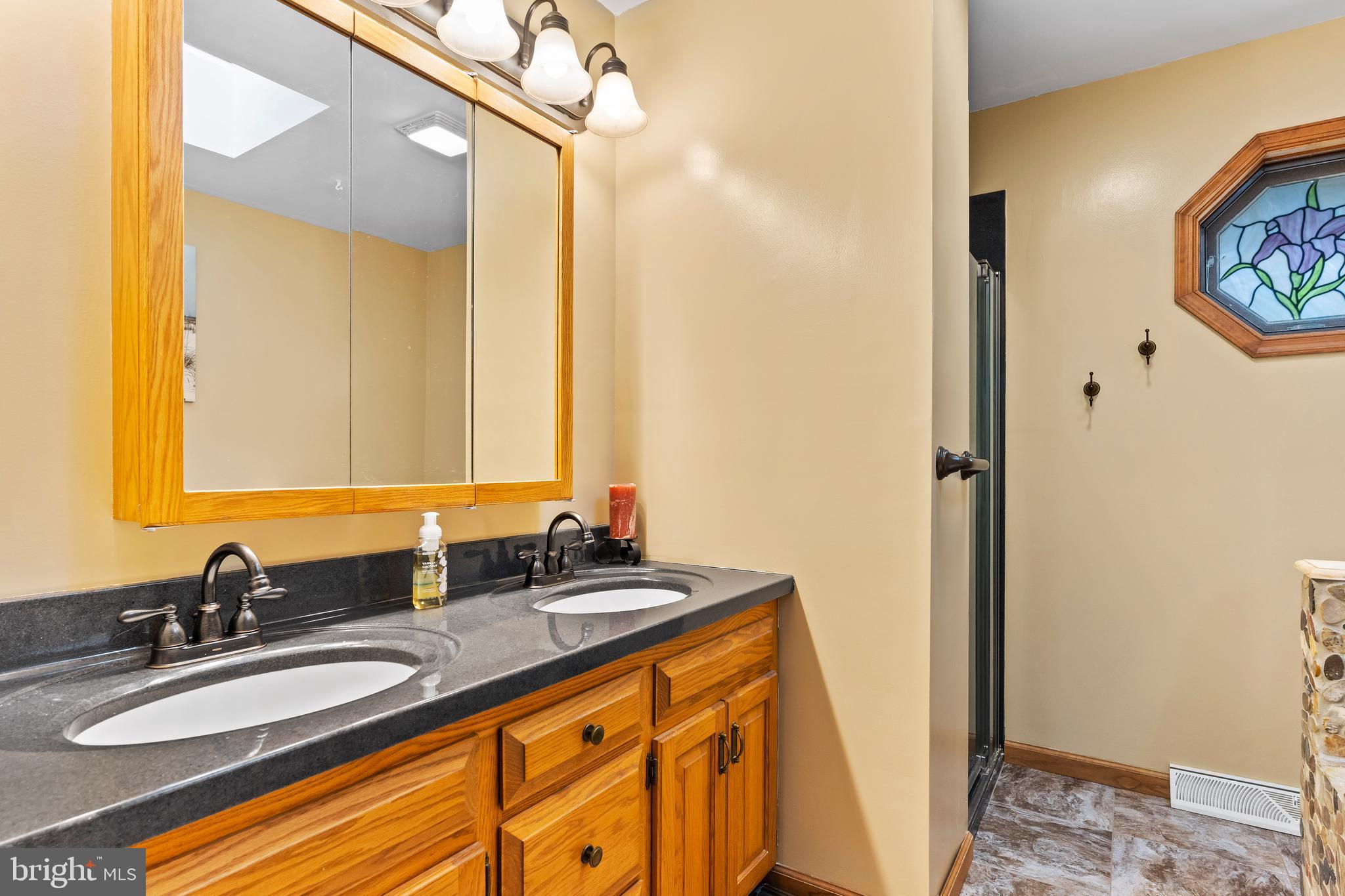 540 Springfield Road Newville, PA 17241 - Photo 27 of 59 a bathroom with a sink and a mirror