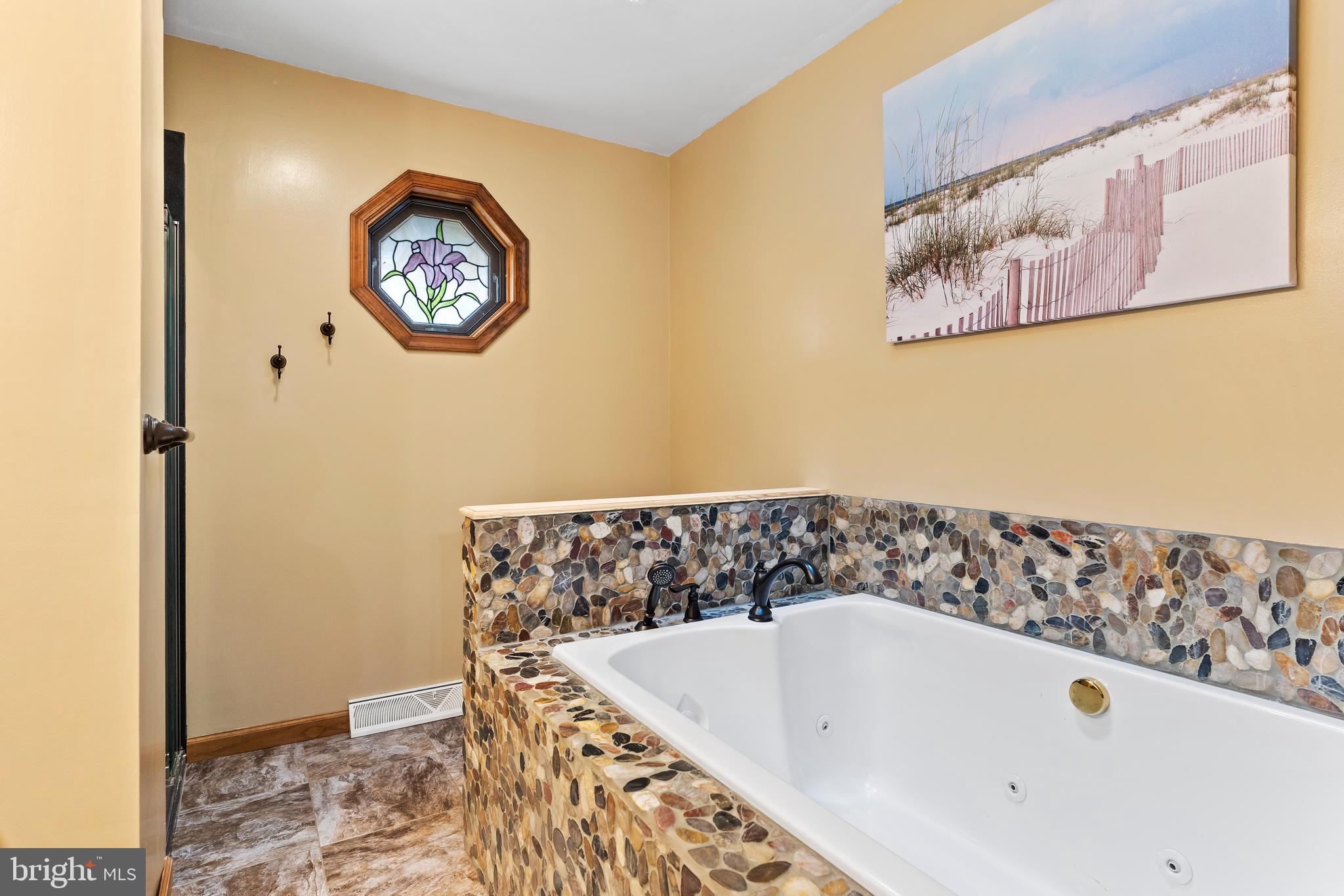 540 Springfield Road Newville, PA 17241 - Photo 28 of 59 a bathroom with a bathtub and a shower