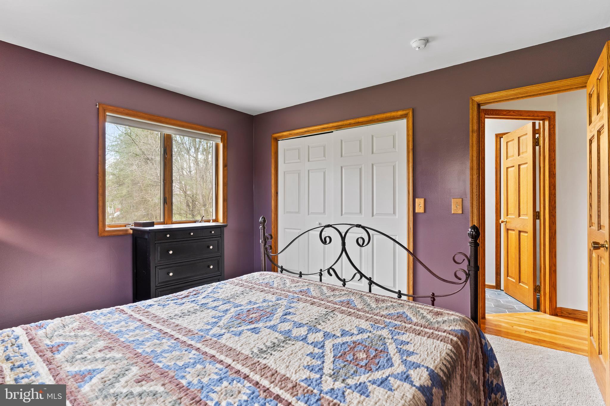 540 Springfield Road Newville, PA 17241 - Photo 31 of 59 a bedroom with a bed and a dresser next to a window