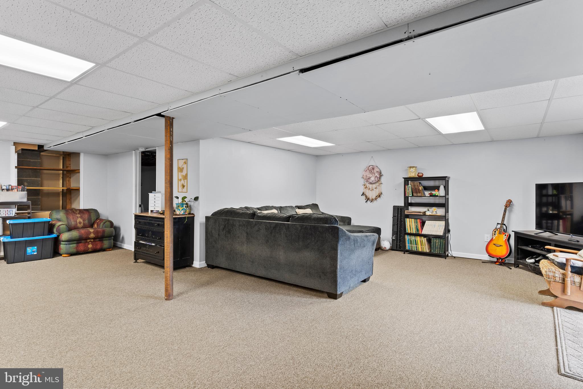540 Springfield Road Newville, PA 17241 - Photo 38 of 59 a living room with furniture and a flat screen tv