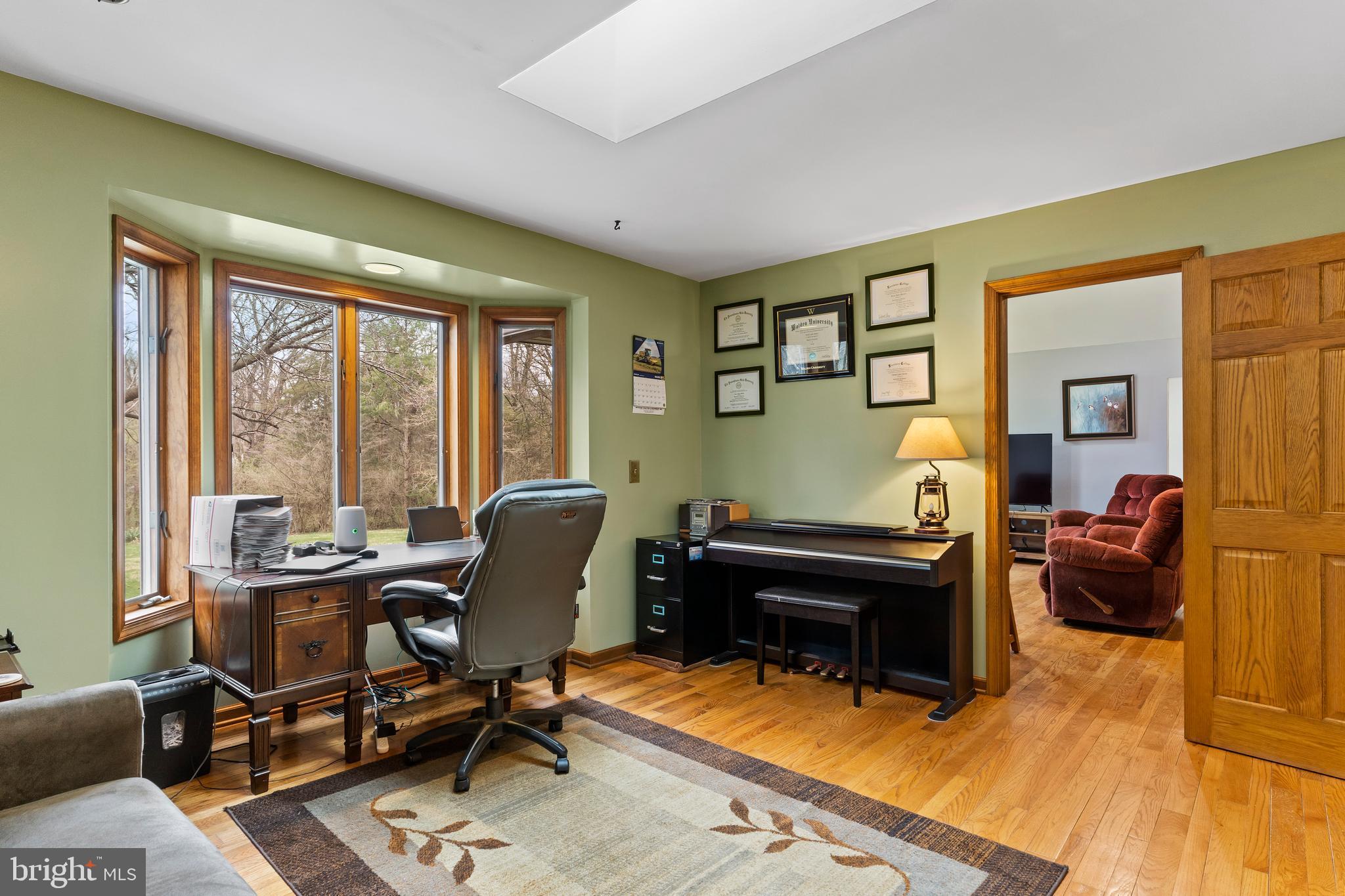 540 Springfield Road Newville, PA 17241 - Photo 10 of 59 a living room with furniture piano and a window
