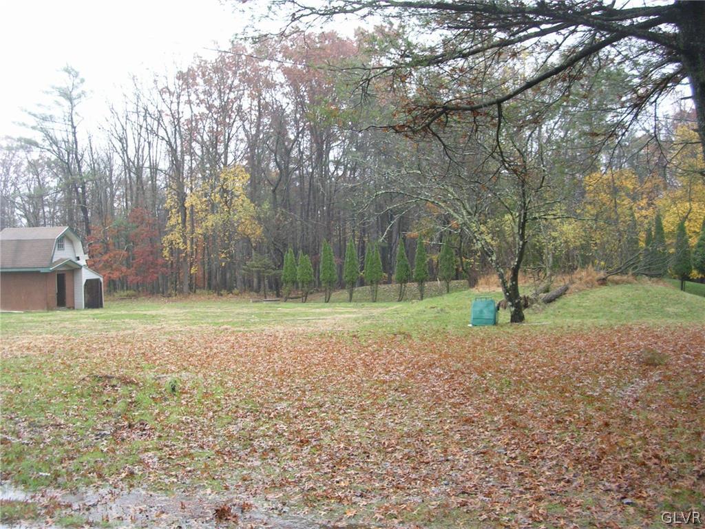1468 Clearfield Road Wind Gap, PA 18091 - Photo 2 of 6 a view of a house with a yard