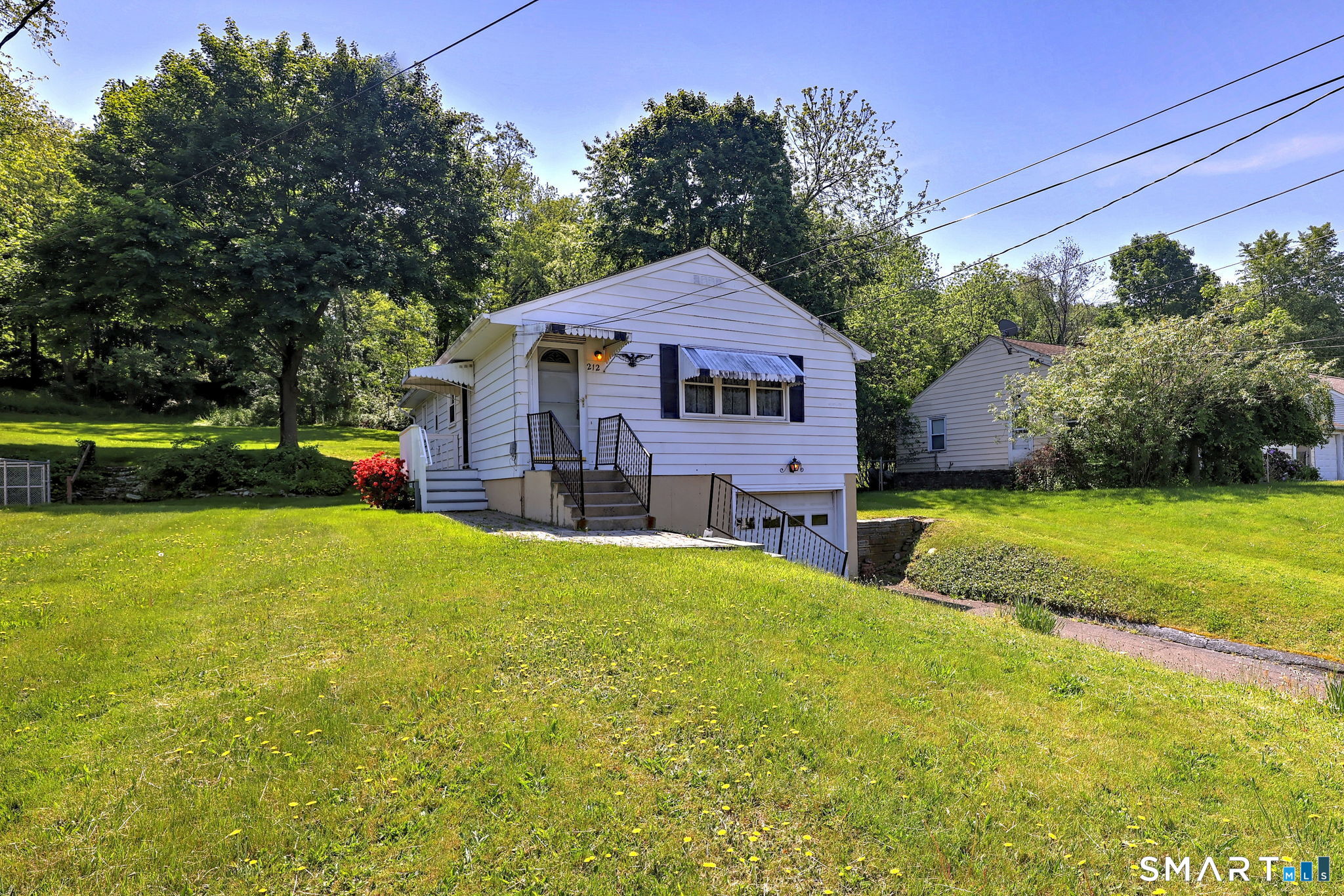 212 Swain Avenue Meriden, CT 06450 - Photo 7 of 38 a view of a house with a yard