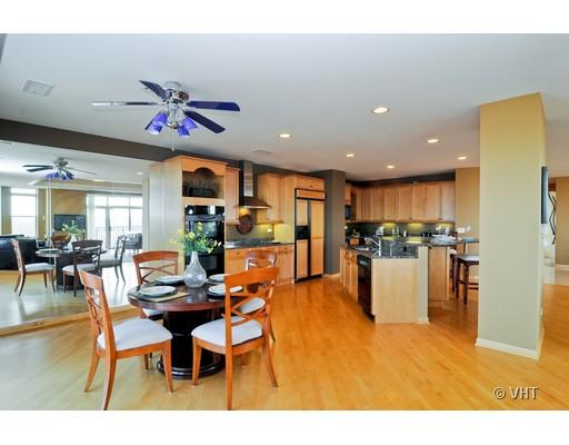 3535 Patten Road, Unit 7E Highland Park, IL 60035 - Photo 8 of 14 a living room with lots of furniture and kitchen view