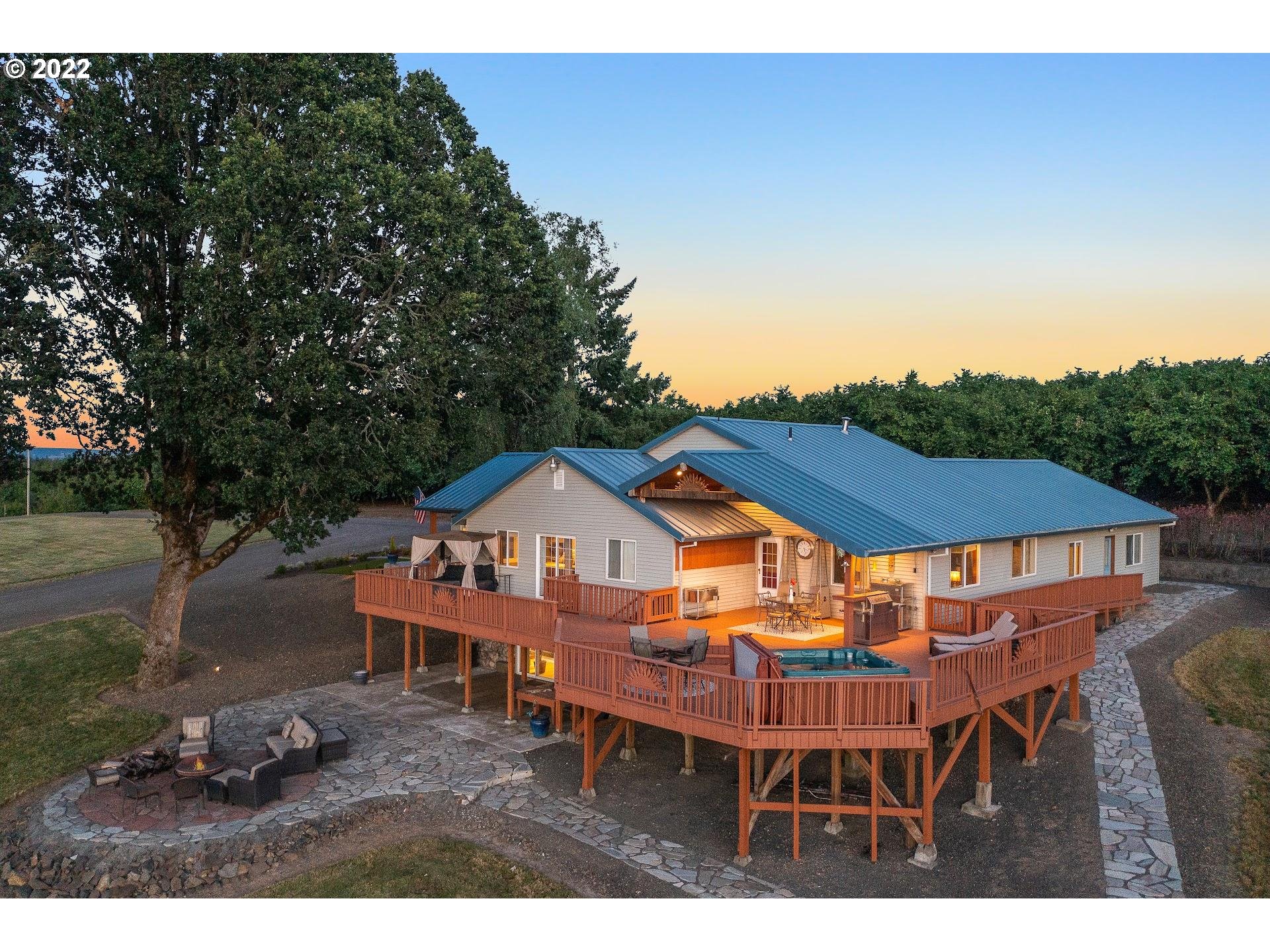 3995 Southwest Lafollett Road Cornelius, OR 97113 - Photo 2 of 32 a view of a chairs and table in the backyard