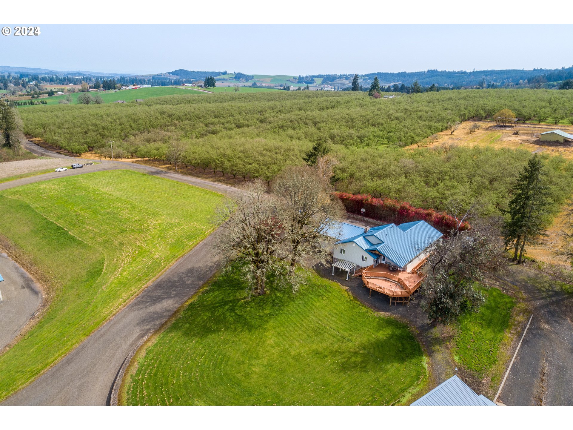 3995 Southwest Lafollett Road Cornelius, OR 97113 - Photo 24 of 32 a view of a lake with a mountain