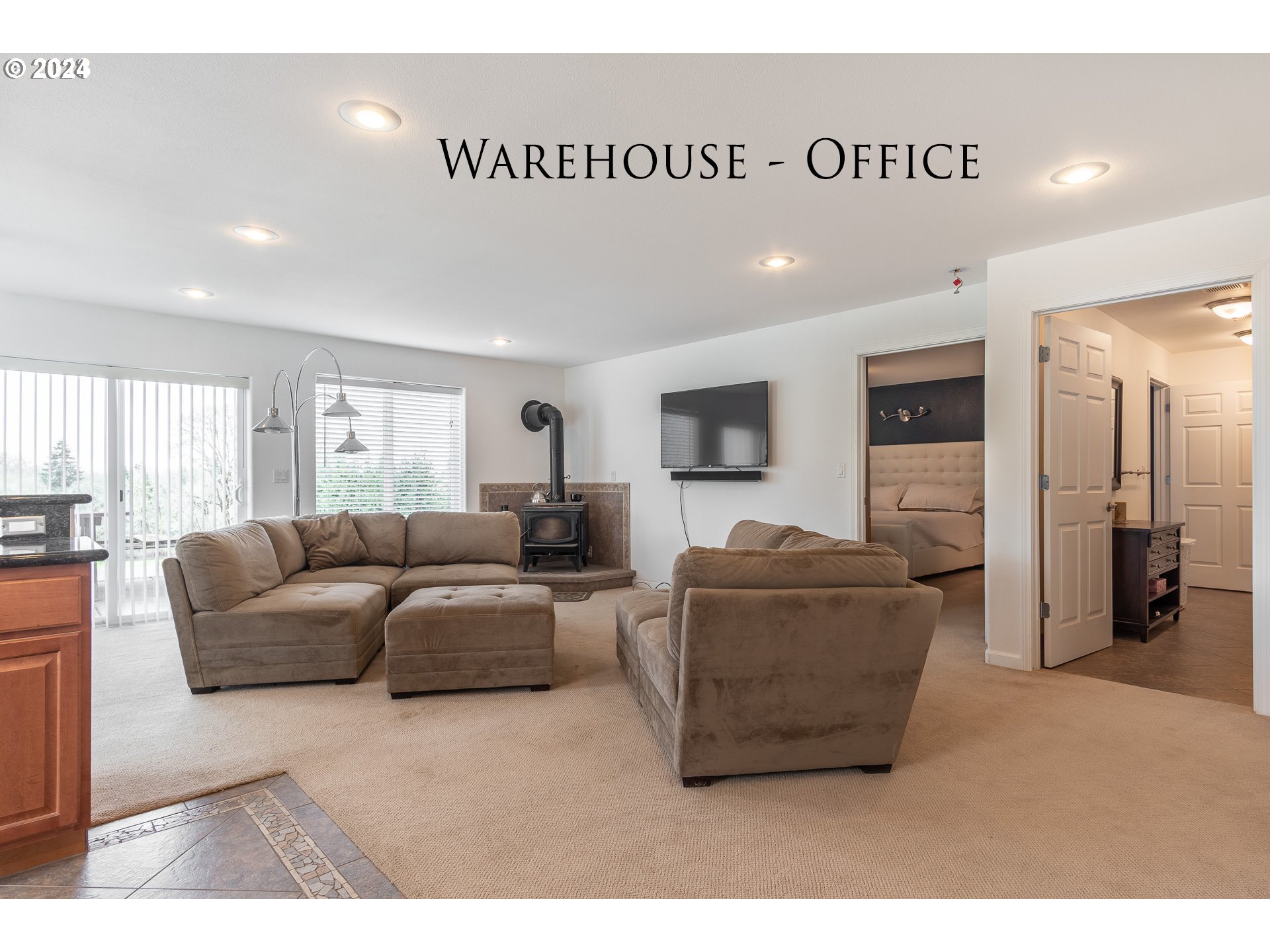 3995 Southwest Lafollett Road Cornelius, OR 97113 - Photo 29 of 32 a living room with furniture and a flat screen tv