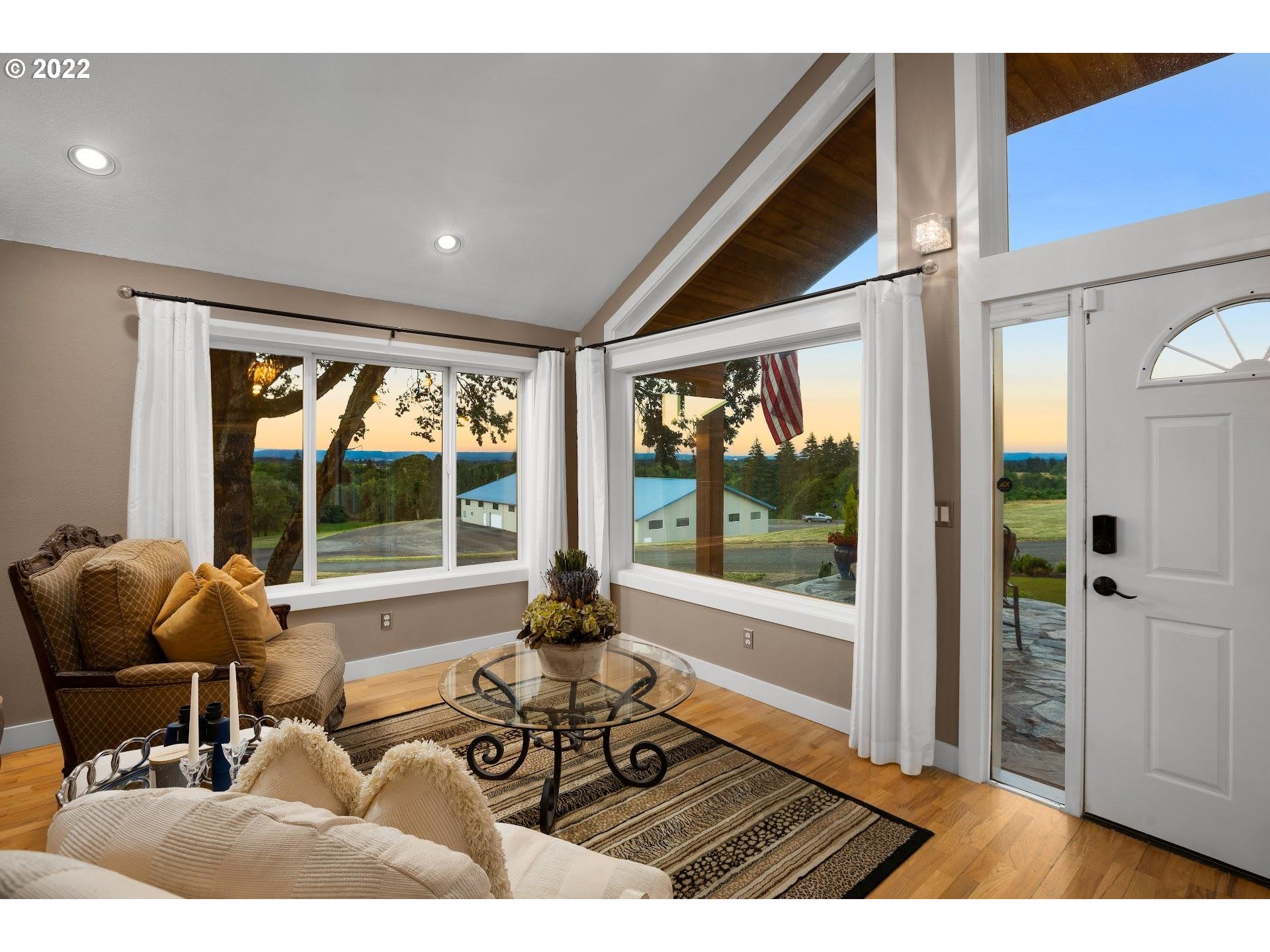 3995 Southwest Lafollett Road Cornelius, OR 97113 - Photo 5 of 32 a living room with furniture and large windows