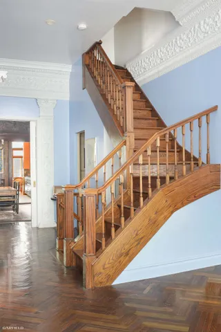 a view of staircase with white walls