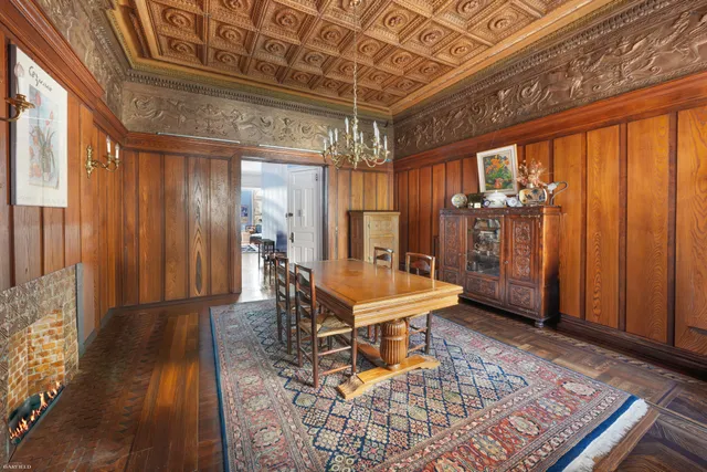 a room with lots of furniture and a rug