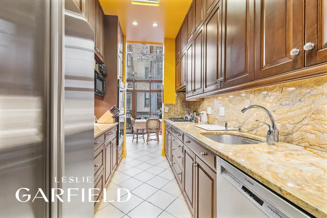 a view of a chair and table on the wooden floor