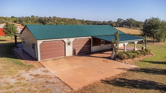 a terrace of a house with outdoor seating